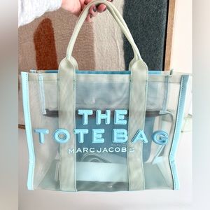 Marc Jacobs. The mesh medium tote bag in pale blue.